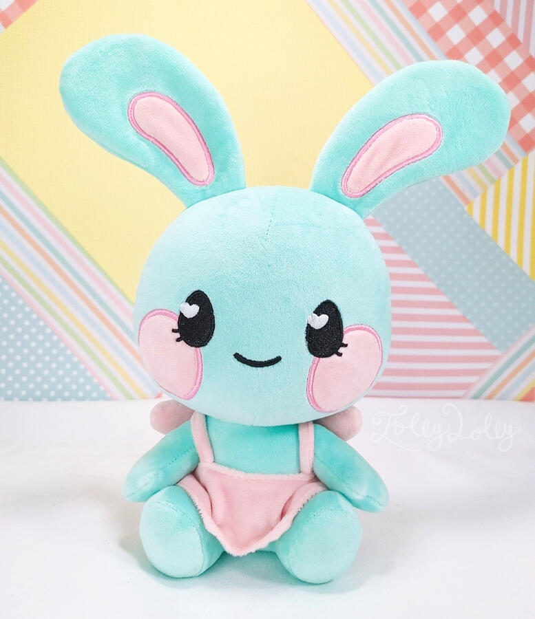 A mint green rabbit plush