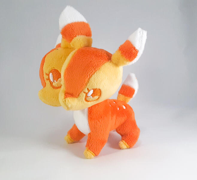 Candy Corn Doppel Deer An orange, white, and yellow two-headed deer plush